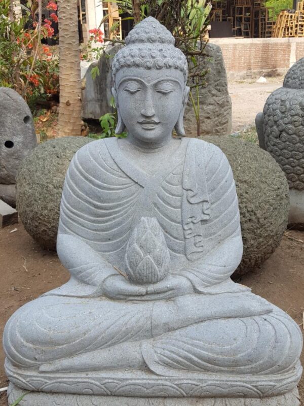 statue de bouddha assis fleur lotusen pierre