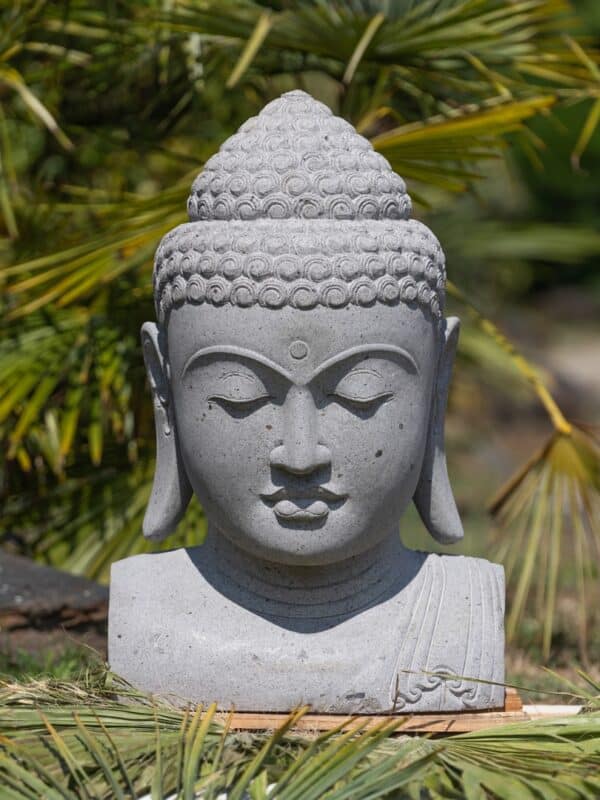 tete de bouddha en pierre naturelle premium souriant