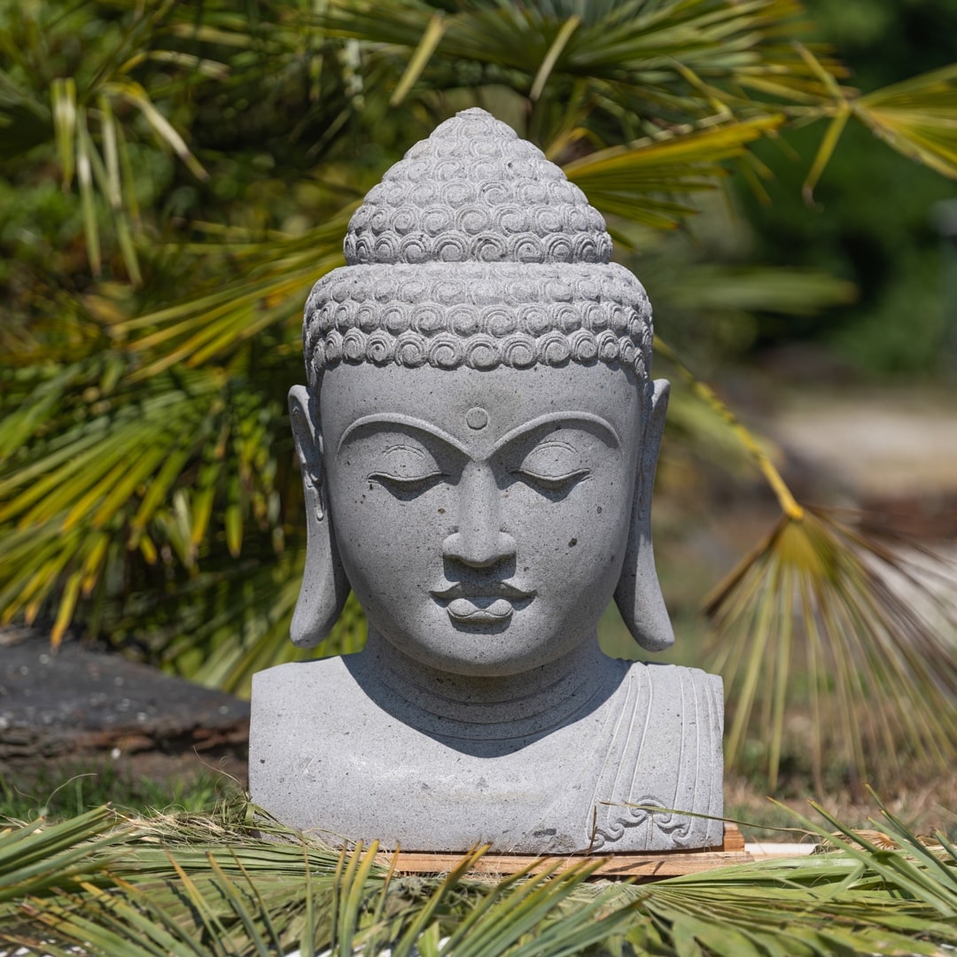 tete de bouddha en pierre naturelle premium souriant