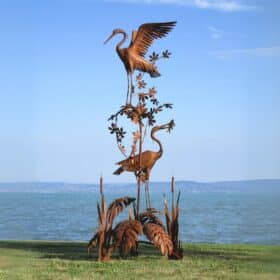 paire statue de 2 hérons cigognes sur végétaux en métal rouillé fer 300cm