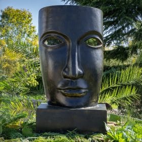 Statue masque noir antique en pierre reconstituée FACE